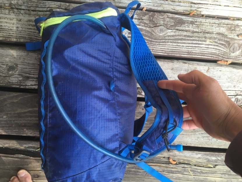 outdoor research payload 18 - the hose pass-through sends the hose away from the wearer. with...