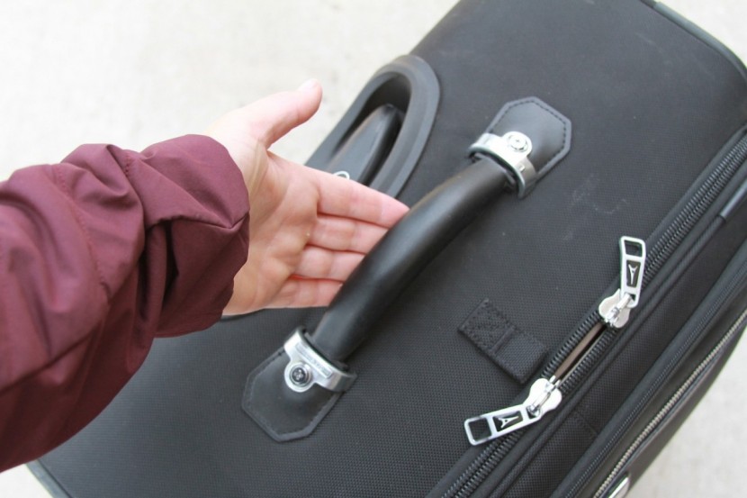 travelpro platinum magna 2 26" - the big leather handle is quite comfortable, as well as stylish.