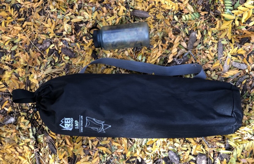 rei co-op camp stowaway low - not too large and not heavy, with two wide straps to help carry it.