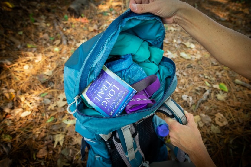 a long, wrap-around zipper means that not only is the lid spacious...