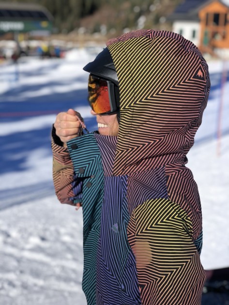 the jet set's oversized hood and tall neck cuff keep out the elements