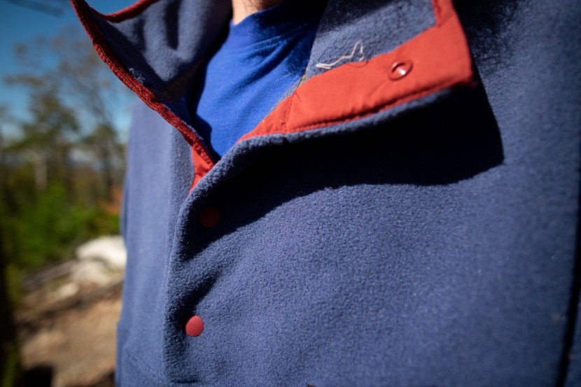 patagonia lightweight synchilla snap-t - the snaps don't extend down too far and the fleece is warm.