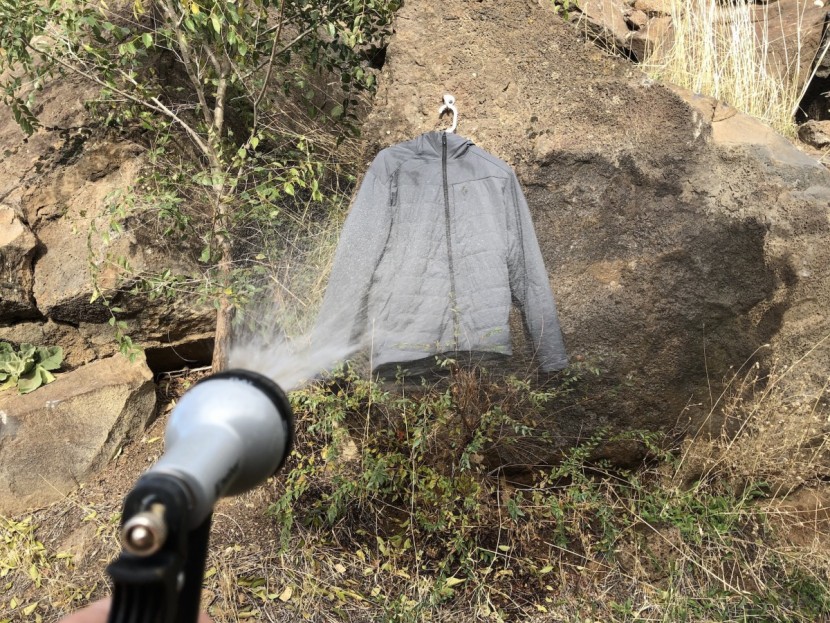 black diamond first light stretch hoody - testing the water resistance by spraying it with the garden hose, we...