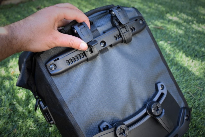 the adjustable top hooks and adjustable bottom latches on the gravel...