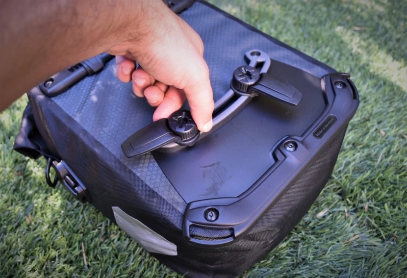 the adjustable top hooks and adjustable bottom latches on the gravel...