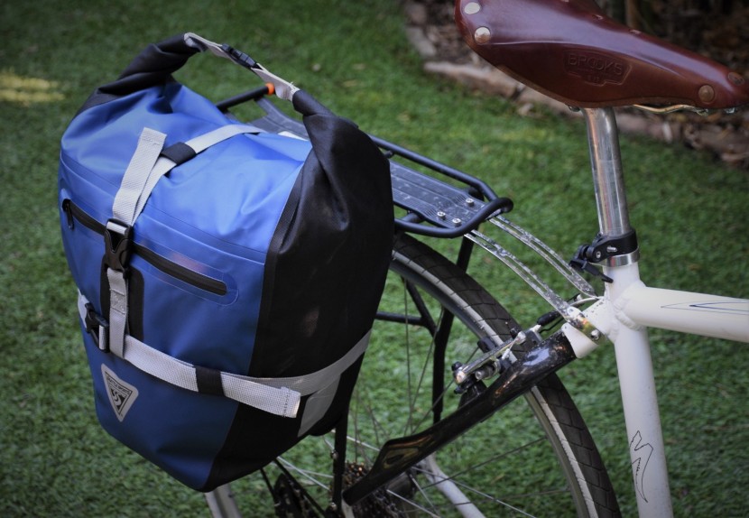 seattle sports titan - the roll-top closure and additional cinch straps making loading...