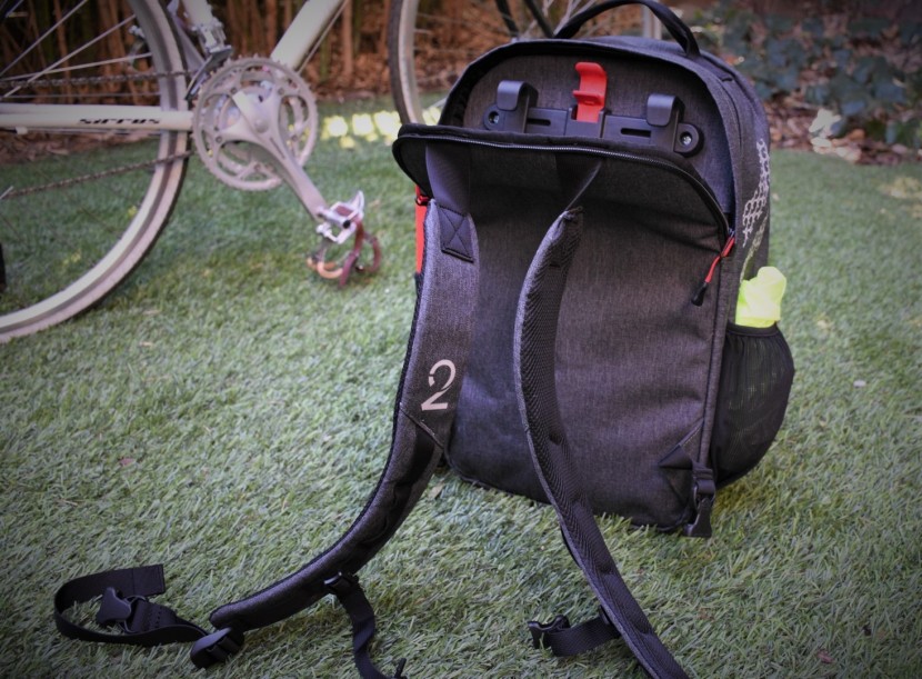 it's very easy to stow away the backpack straps for bike travel, but...