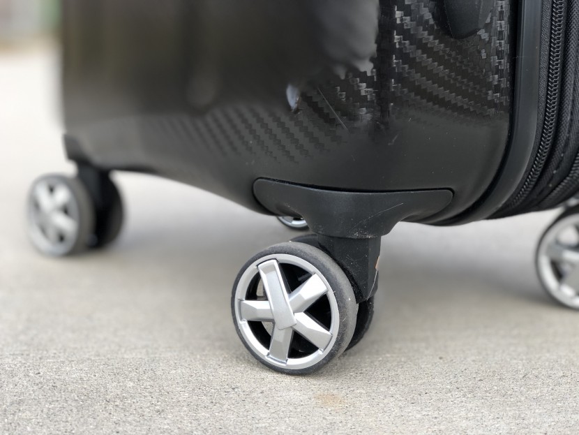 amazon basics oxford expandable 20" - the small wheels aren't well-equipped to handle much more than the...