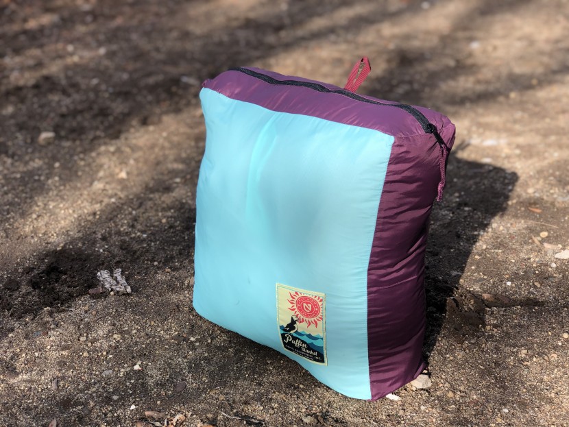 camping blanket - though most camping blankets come with some sort of stuff sack...
