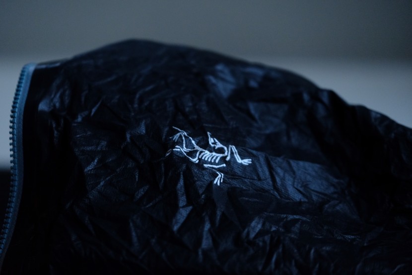 the jacket's logos are reflective, an added feature providing...