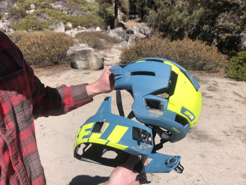 bell super air r mips - the chinbar releases with two clamps on the rear of the helmet...
