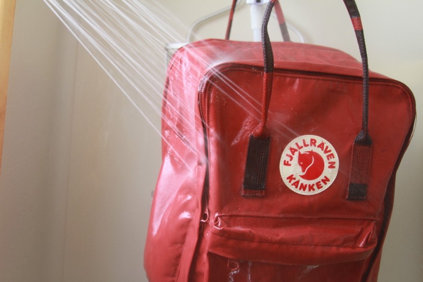 fjallraven kanken 15" - taking the brunt of our shower tests. we put it under the water for...