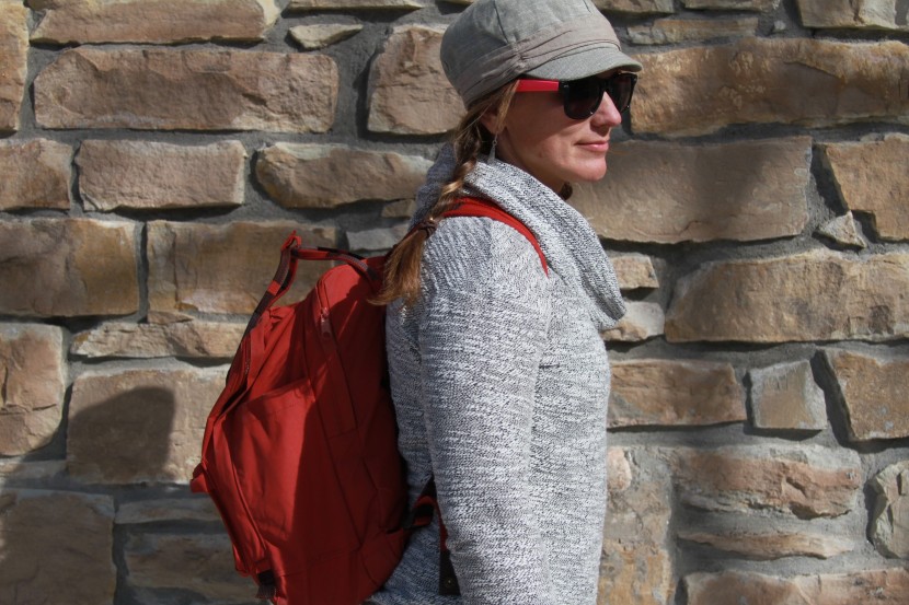 fjallraven kanken 15" - the straps are thin and the bag pulls back when weighted down. this...