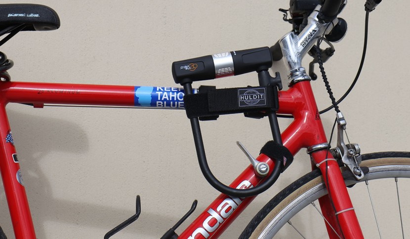 via velo u lock with cable - given its size, we were able to mount the lock at various locations...