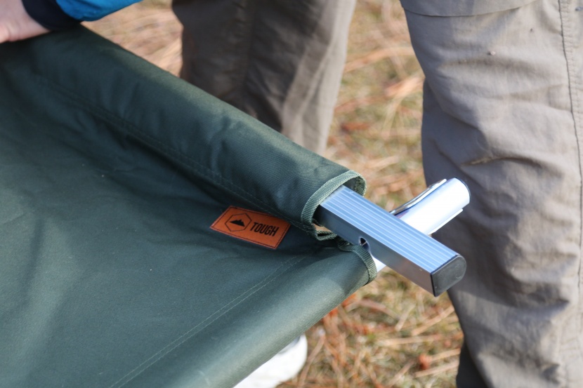 tough outdoors cot - you have to put some work in when clipping the head and foot bars...