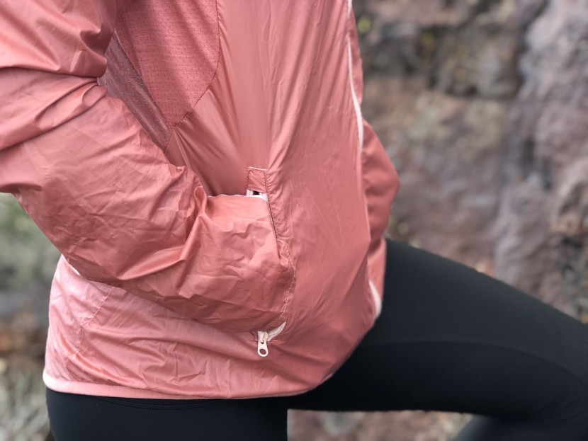 smartwool merino sport ultra light hoodie for women - large zippered hand pockets and a fully elastic hem keep this jacket...