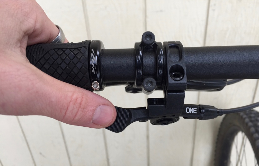 oneup components v2 - the machined aluminum oneup remote has good ergonomics, a light...
