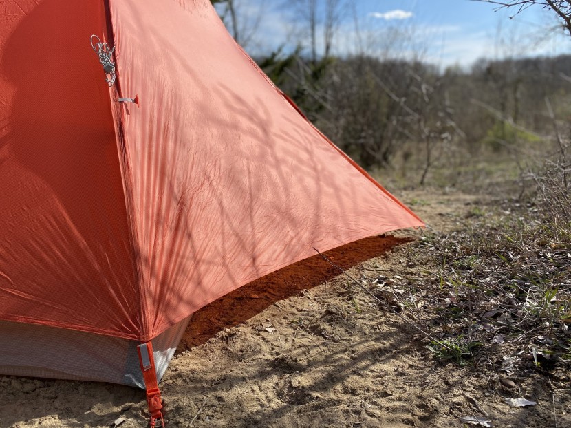 backpacking tent - a double-wall tent has a traditional 'body', dedicated poles, and a...