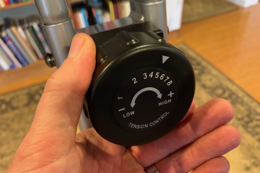 exerpeutic folding magnetic upright bike with pulse - the resistance level is controlled by turning a knob.