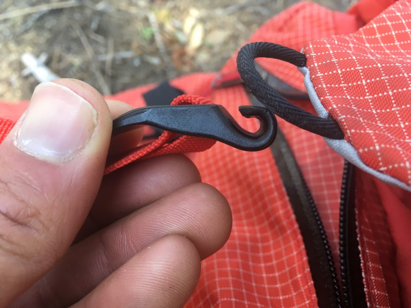 arc'teryx alpha ar 20 - this plastic hook is the closure for the lid. while it's quite...