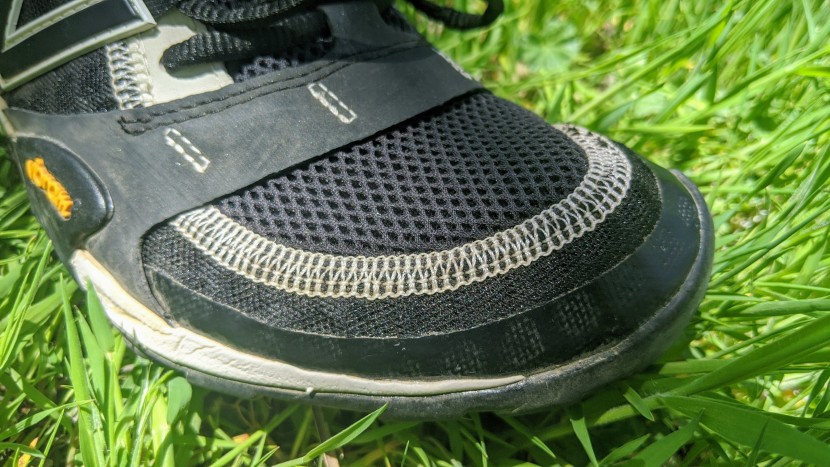 new balance minimus trail 10v1 - a lapped seam adds reinforcement to the point where the two types of...