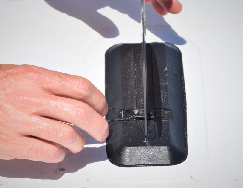 roc 10' explorer - the sliding tab that clicks into place on the removable center fin...