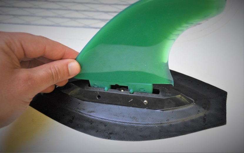 the two smaller side fins click into place and are tightened with a...