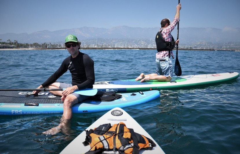 paddle board - an inflatable board's softer surface material is more forgiving than...