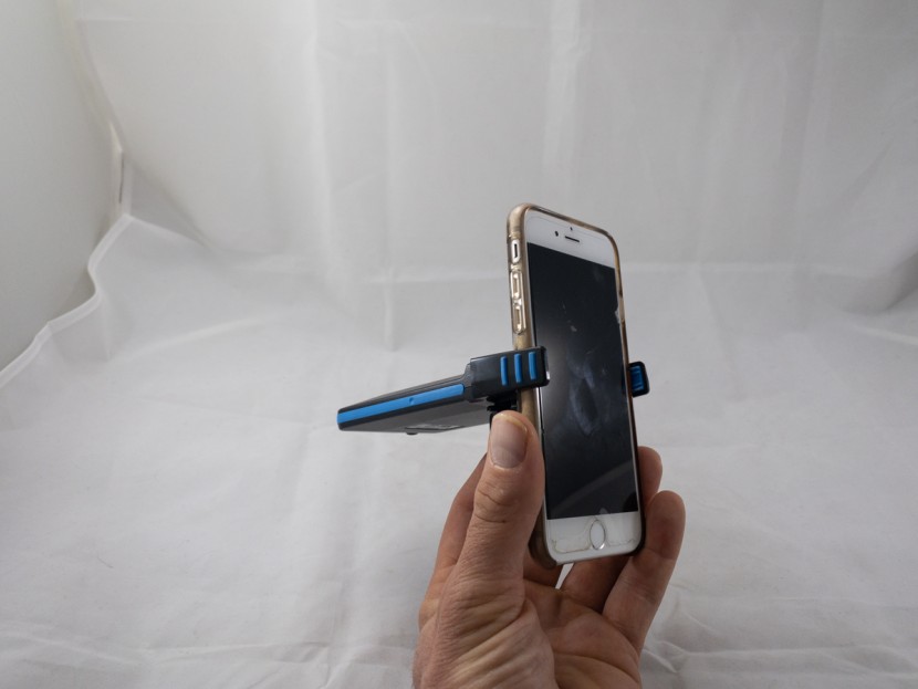 higher ground satpaq - the satpaq "attached" to a smartphone. the three-blue-striped "jaws"...