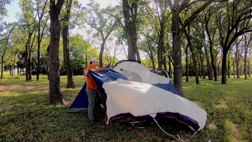 coleman elite montana 8-person - wrangling the rainfly while field testing.