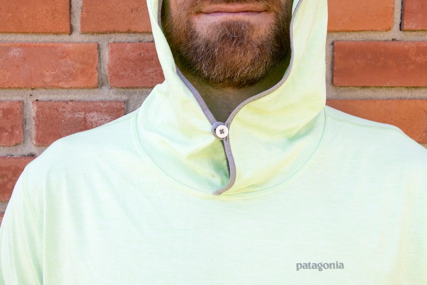the hood of the tropic comfort hoody ii features a simple button at...