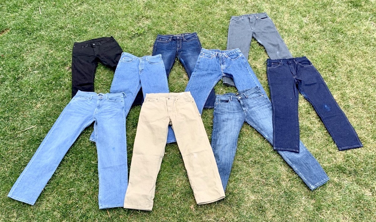 Best Jeans For Men Review (Our selection of men's jeans, lined up and ready for testing.)