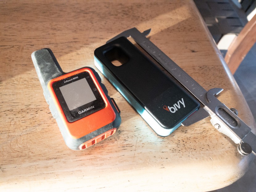 personal locator beacon - another size comparison of these two performers.