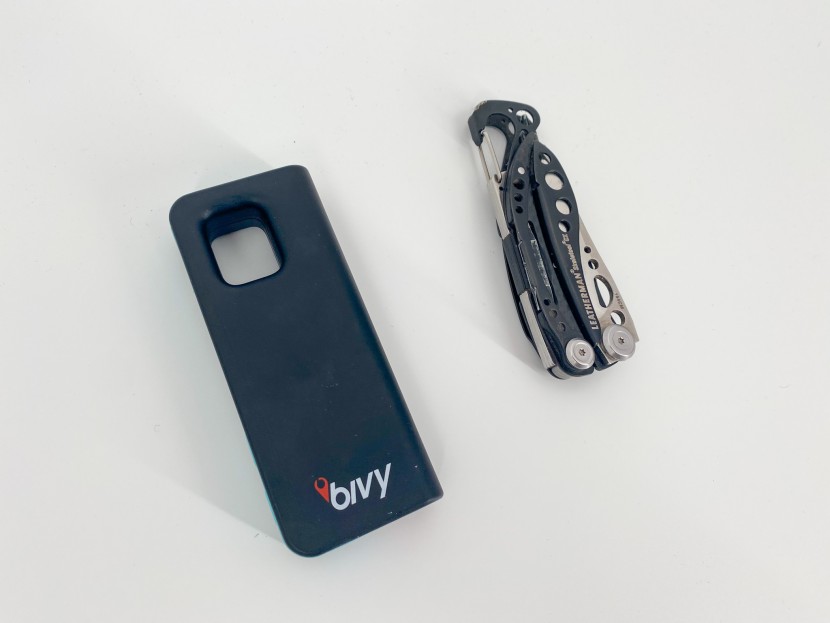the bivy stick with a compact multi tool for size comparison. this...