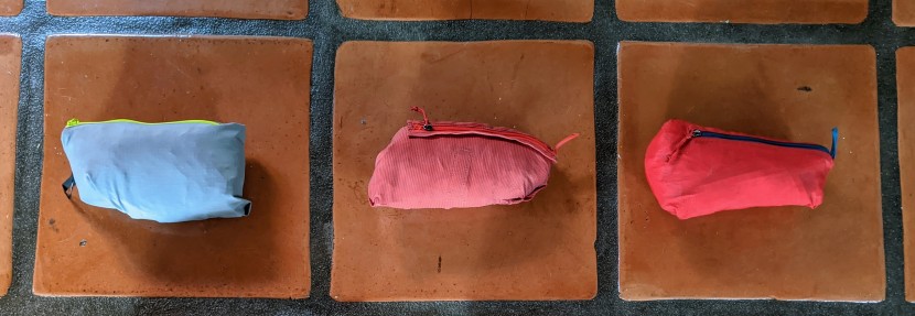 a side-by-side comparison of packed size: arc'teryx squamish (left)...