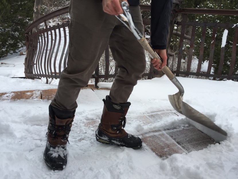 the author using grips for security while shoveling an upper-level...