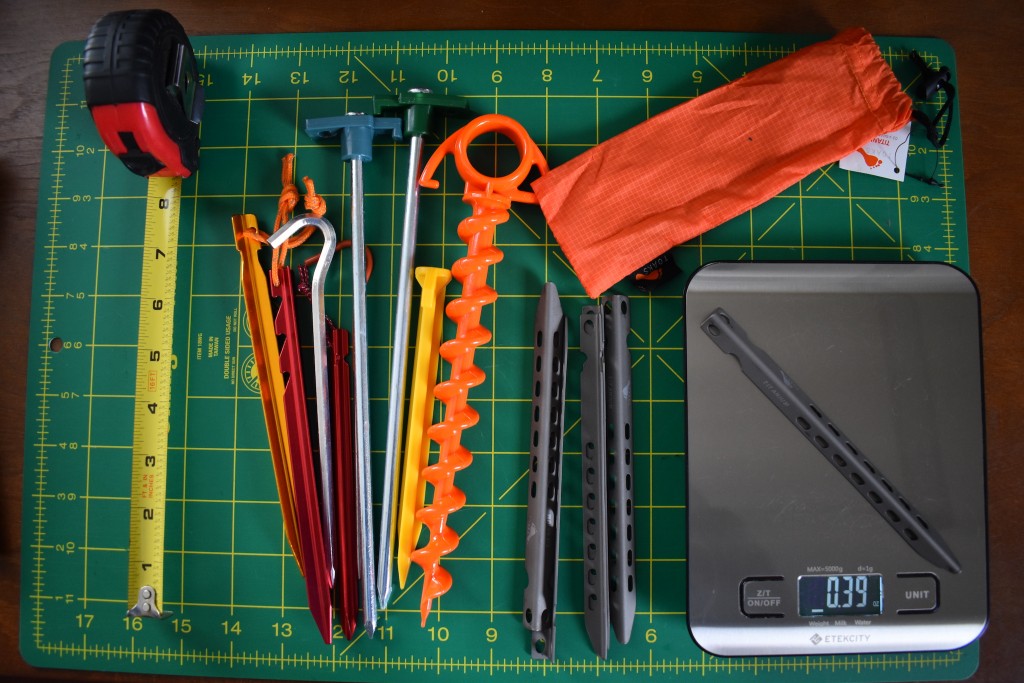 tent stakes - stakes lined up to have their measurements taken.