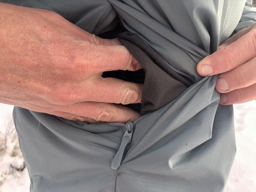 arc'teryx atom ar hoody - the zippered handwarmer pockets are both lined with soft tricot...