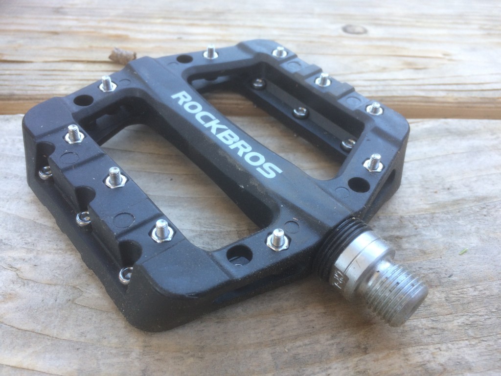 rockbros nylon fiber - this pedal is simple, functional, and inexpensive.