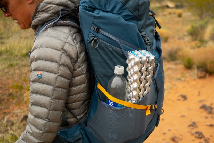 the z seat fits in the side pocket of most any pack, even alongside...