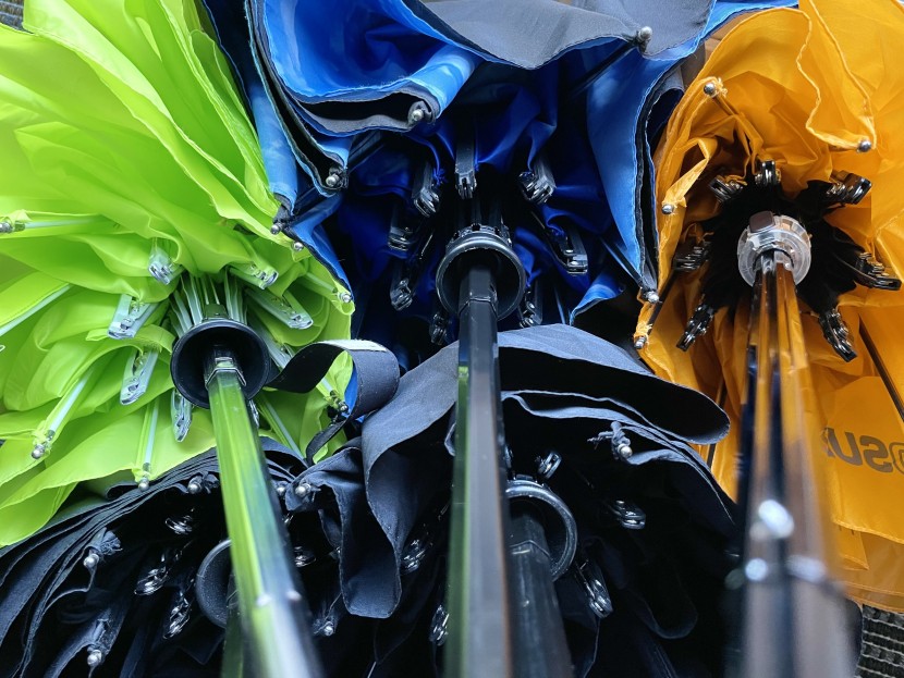 a close-up of the many moving parts that often comprise compact...