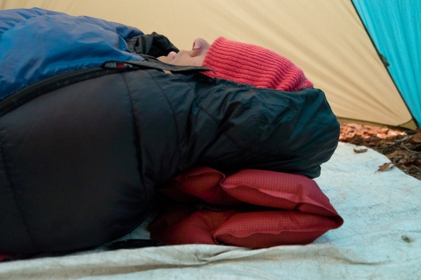 the thickness of the pillow can be adjusted by releasing or adding...