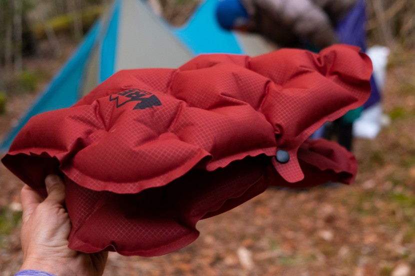 snaps in half to create a pillow.