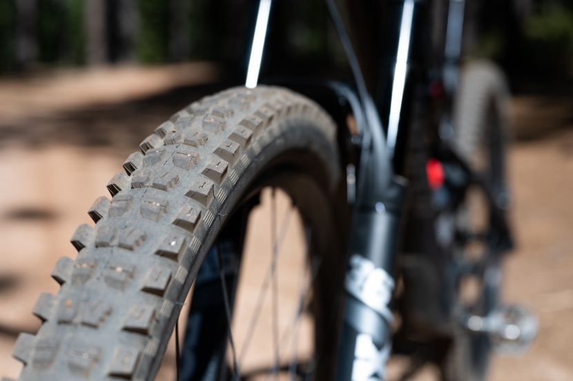 an aggressive specialized butcher grid trail 2.3-inch tire with the...