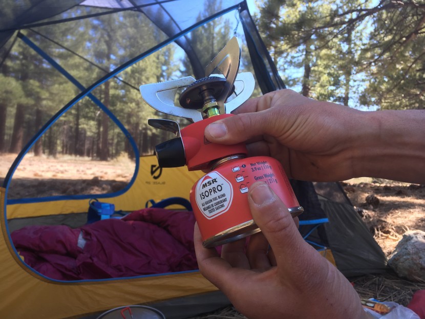 coleman peak 1 - the red plastic base of this stove made attaching and detaching the...