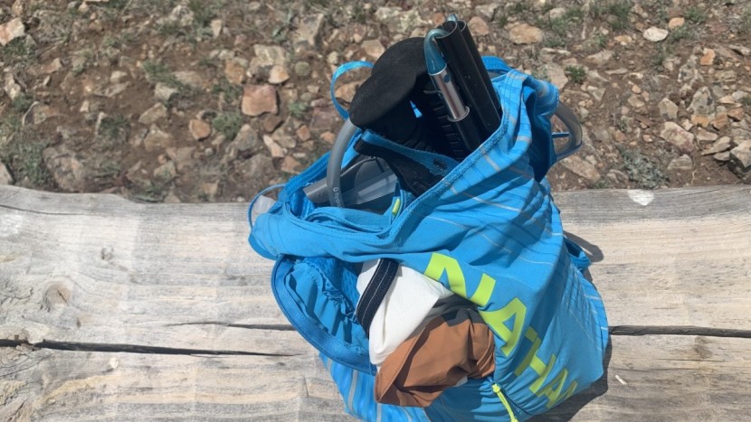 hydration pack for running men - the pinnacle 12 offers an additional side access point for the main...