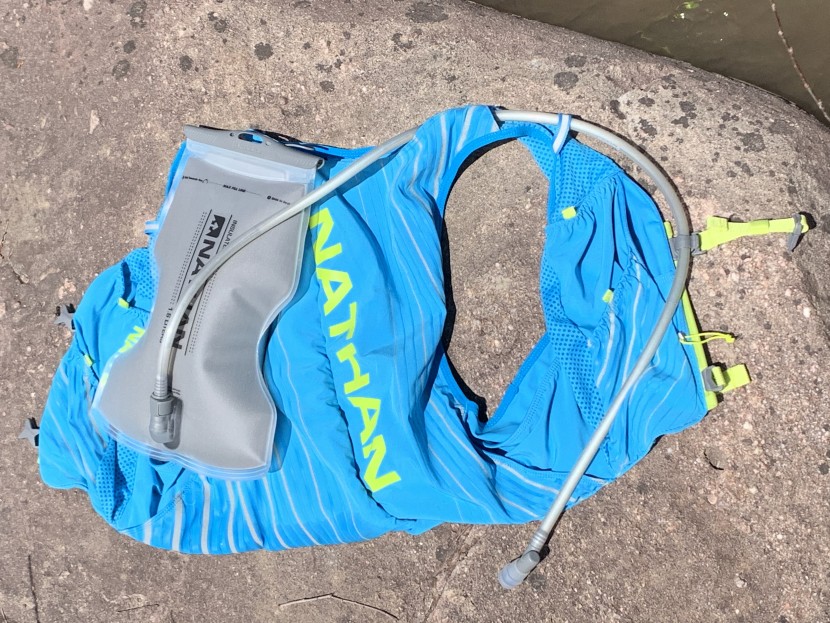 hydration pack for running men - this hourglass-shaped 1.6-liter reservoir prevents unwanted...