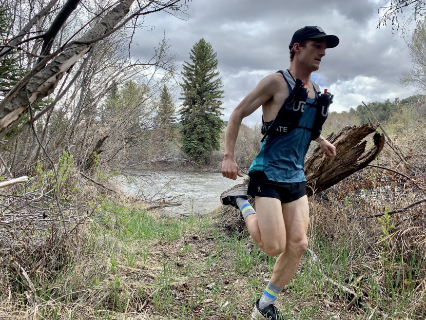 ultimate direction halo - collapsable poles store on the front of the vest. we fiddled to get...