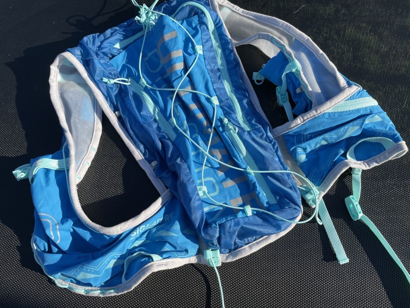 hydration pack for running womens - the external bungee system on the ultra vesta 5.0 acts as a...