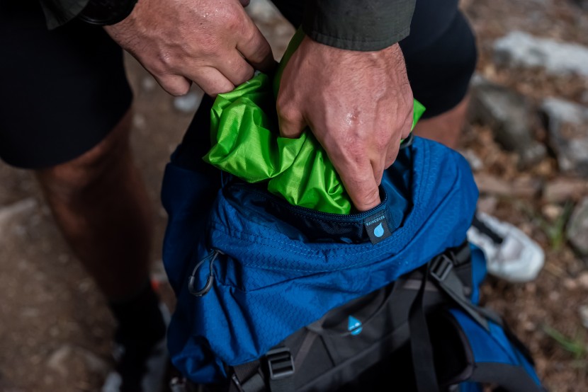 osprey aether 65 - the top pocket on the lid is marked for the raincover, but the cover...
